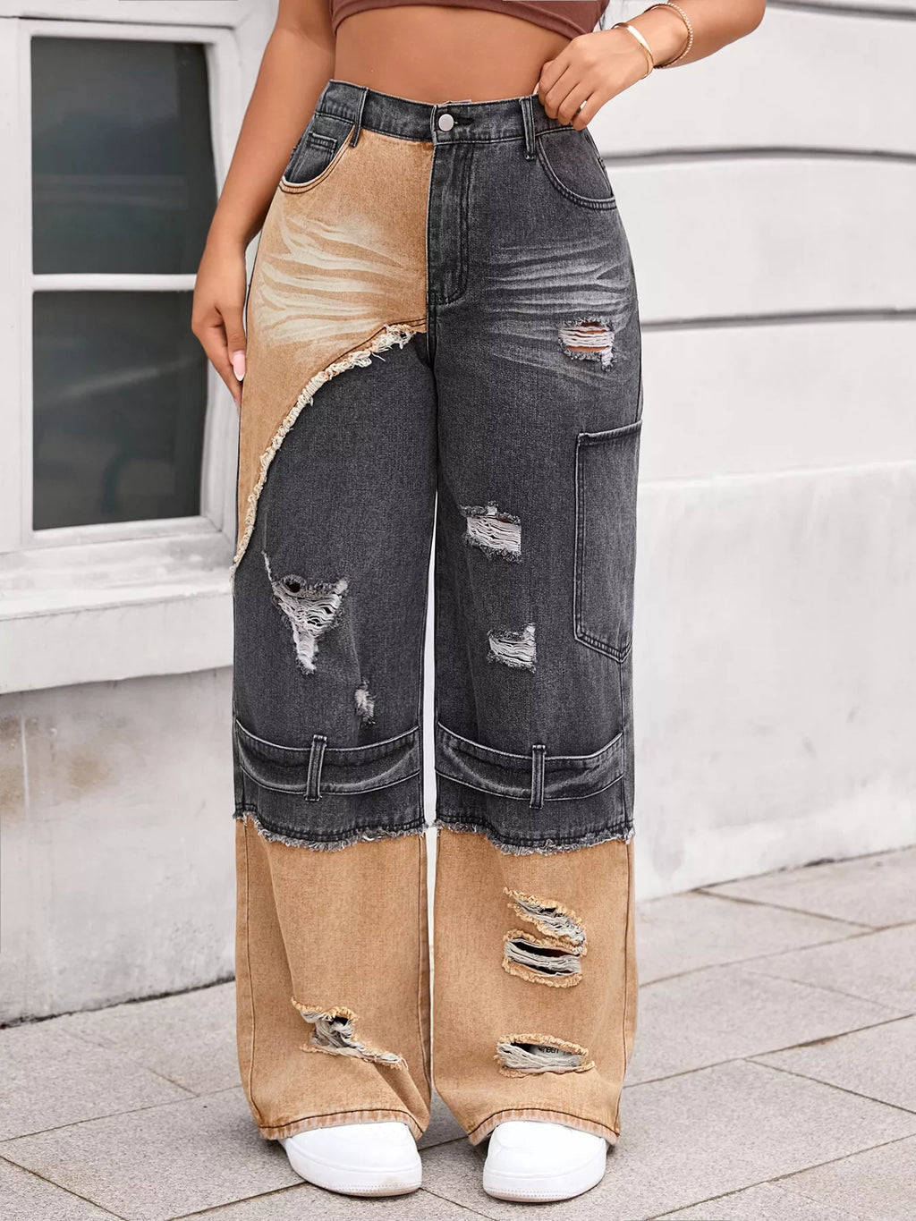 Two-tone wide leg jeans with ripped detailing.