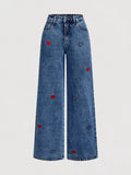 Dark blue wide-leg jeans with embroidered heart detail.